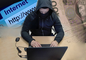 zamaskowany mężczyzna siedzący przed komputerem w tle adres strony internetowej